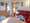 Pension Wiesenau | Bungalow - Wohnzimmer - Couch - Essbereich