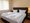Ferienanlage Zum Knirk | Ferienwohnung 24 - Schlafzimmer - Doppelbett